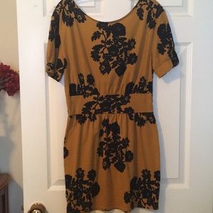 Cute mustard dress with black floral pattern